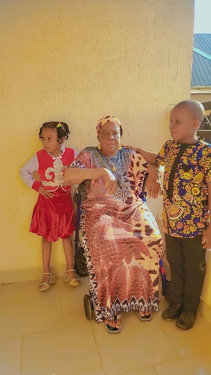 Mama with some of her grand-children, Chukwunyerem and Chimamanda.