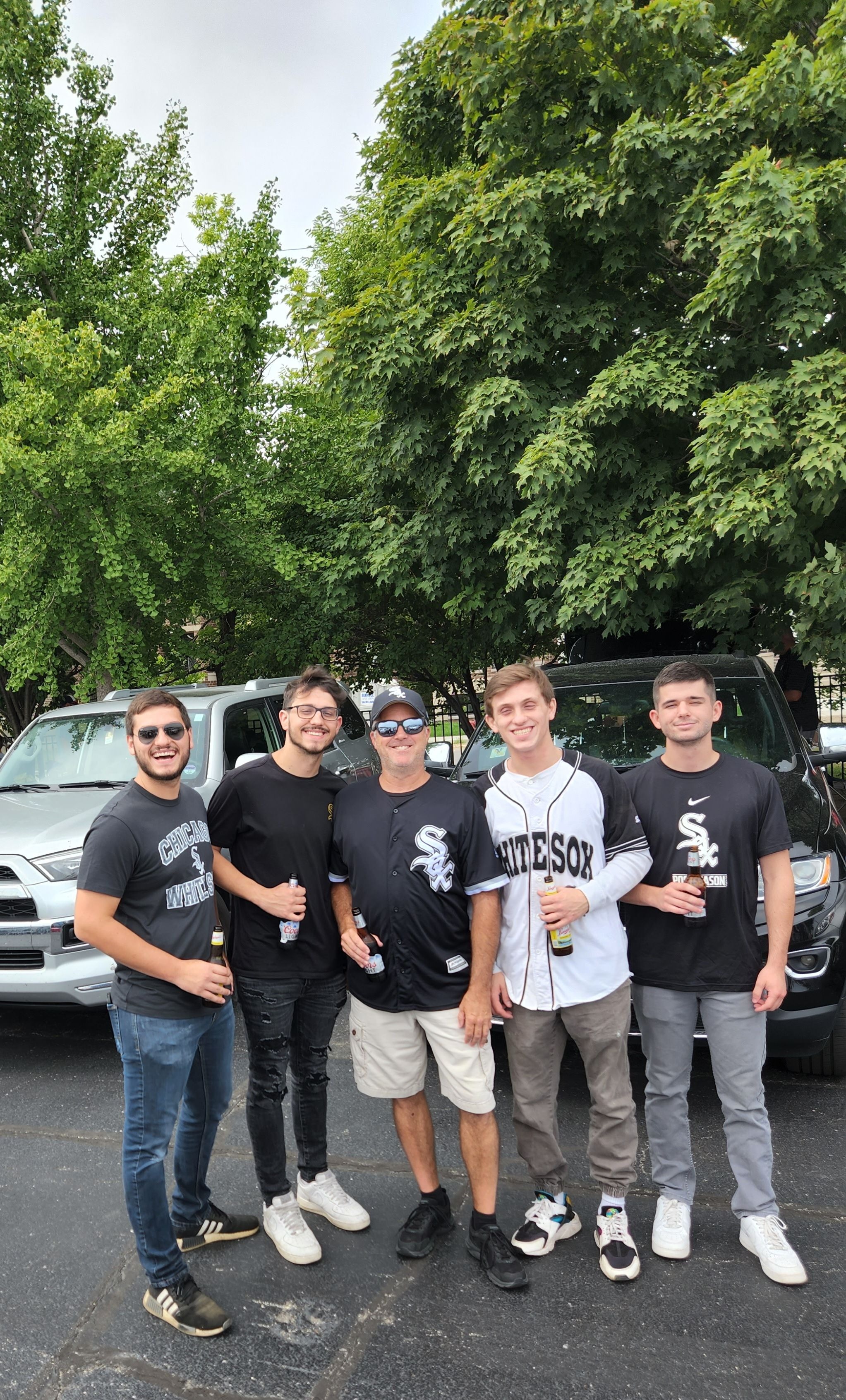 Phil taking boys to first baseball game.