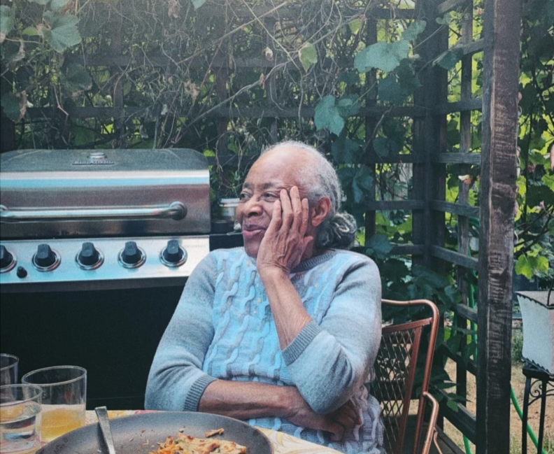 Mom enjoying a relaxing on the back deck of our Lafayette home for and outside dinner.