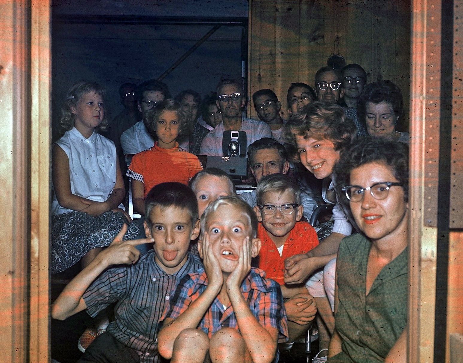 David is front and center, watching home movies with aunts, uncles and cousins!
