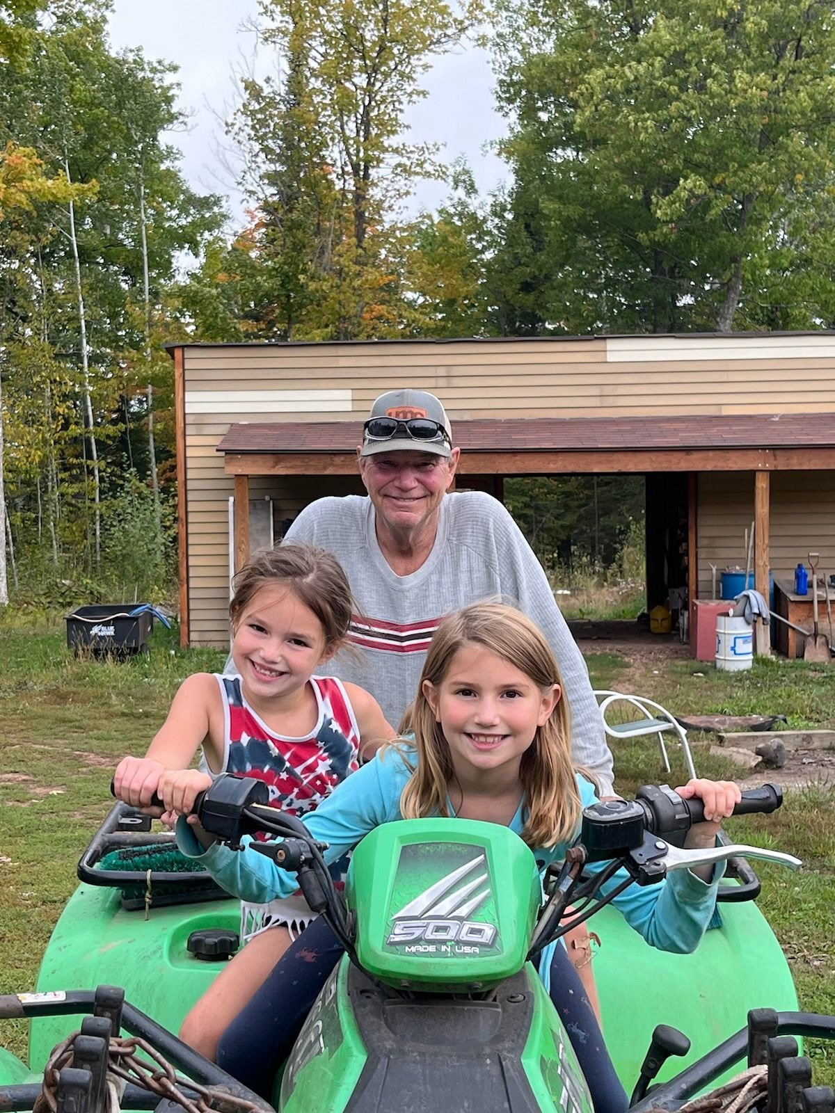 Grandpa with his girls!! ( my 2 daughters River and Ivy) .  He just loved it when we would come up north to his property.   