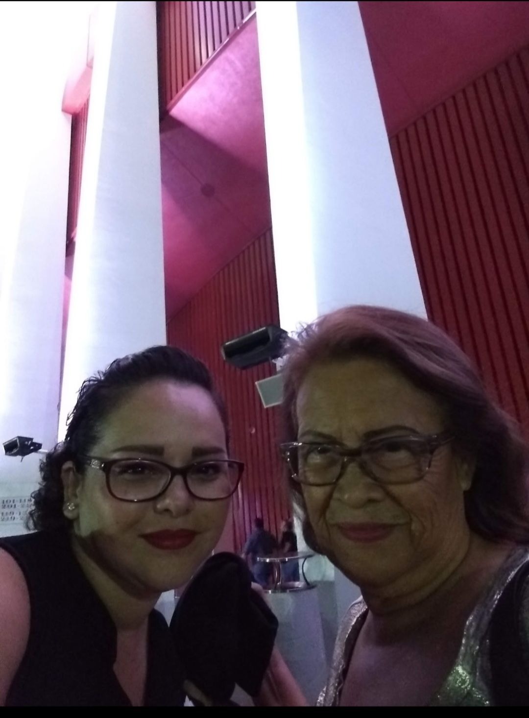 Mami and I at the Mana concert! Mom loved Mana!