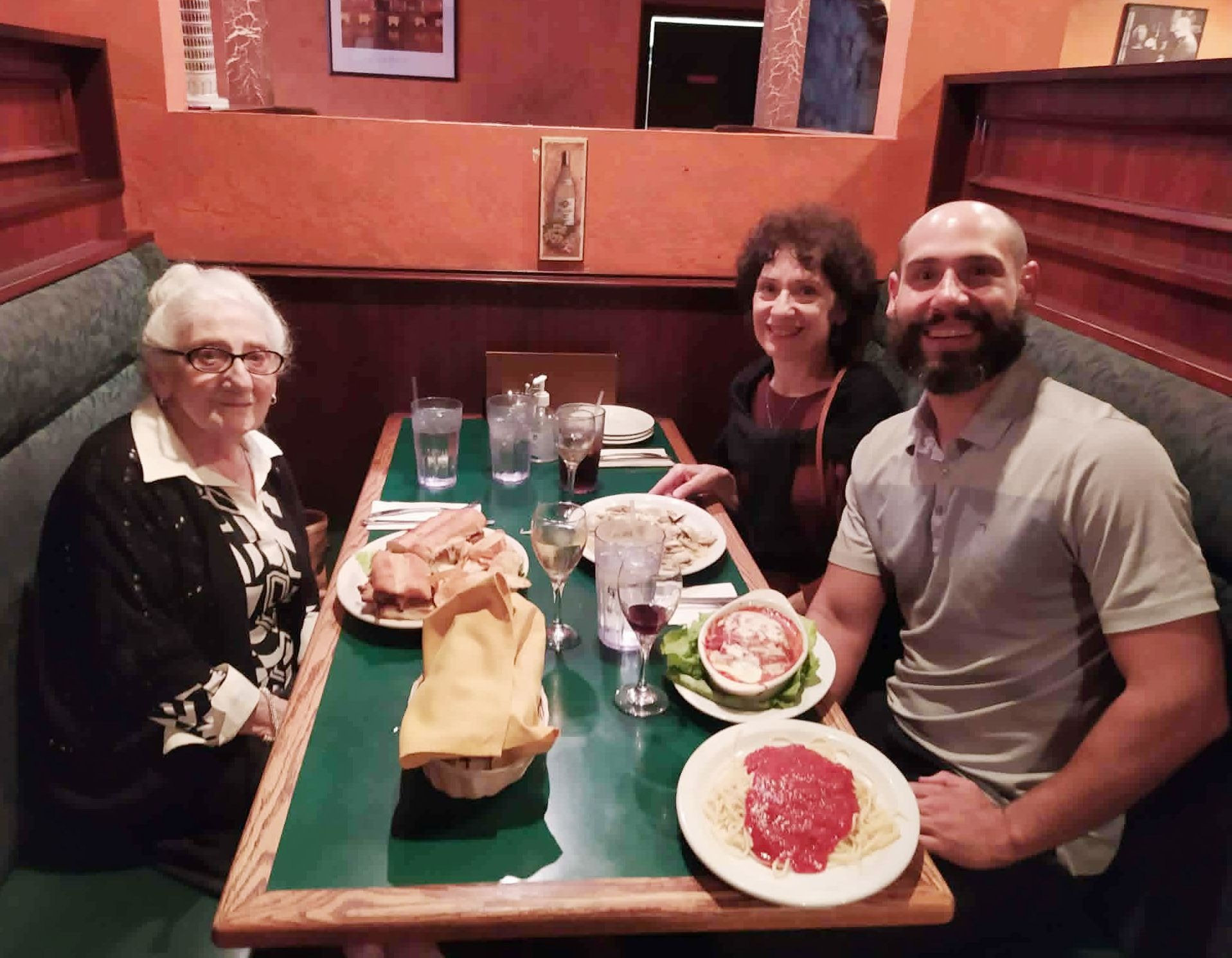 Nonna, Lydia and Dorian enjoying dinner out.