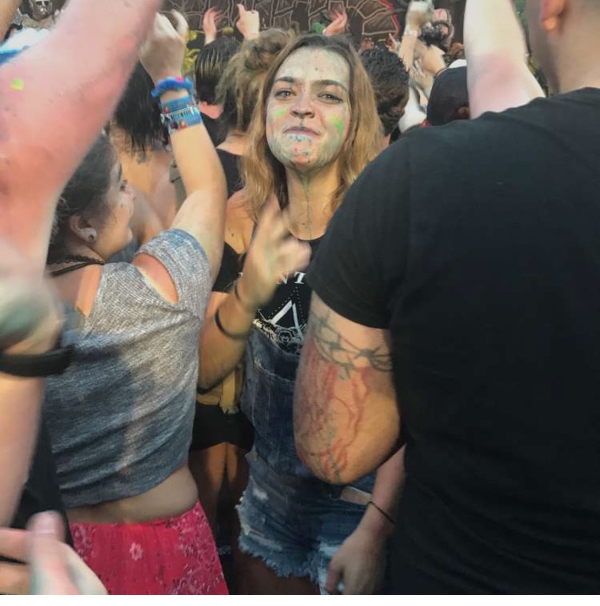 This was at warped tour and Katie had never been. She wasn’t fully into the kind of music they play there but she was excited to go just for a new fun experience with her friends. She crowed surfed and she even got in the mosh pit (which made me very nervous) In this picture we were at on of the stages and they were spraying everyone with green and blue water. I loved seeing the pure joy on her face the whole entire day. She always has known how to live life to the fullest and enjoy every moment no matter what Love you and miss you Katie.