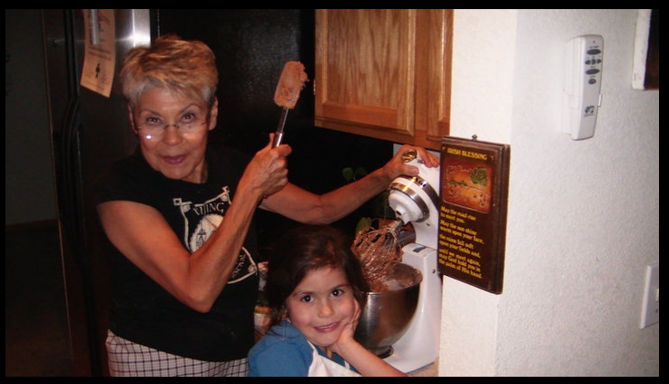 Gloria and Olivia making cookies