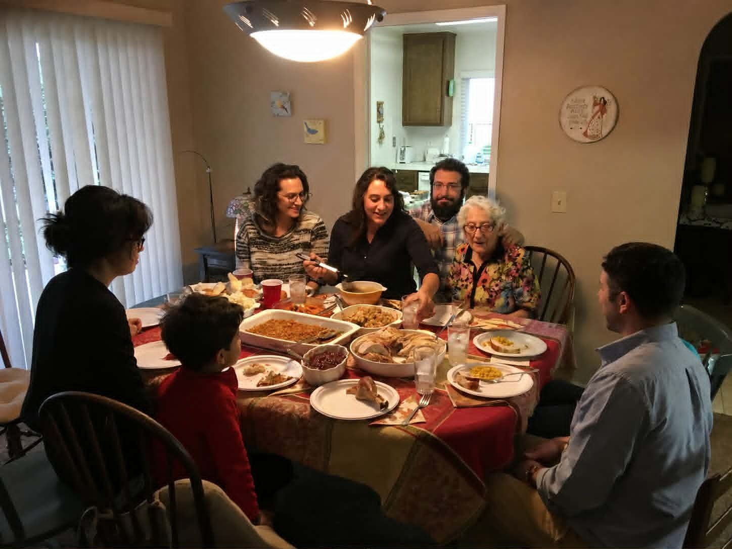 Grandson Alex, his family and cousins enjoy a meal prepared by their Nonna.