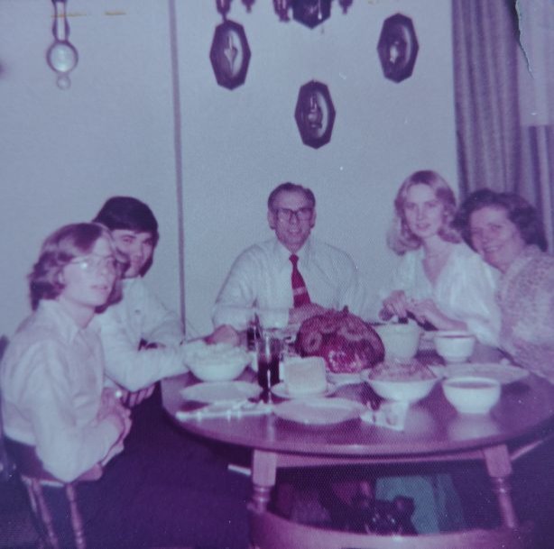 gathering around the table for a great meal with Dad, Mom, Bridget and David