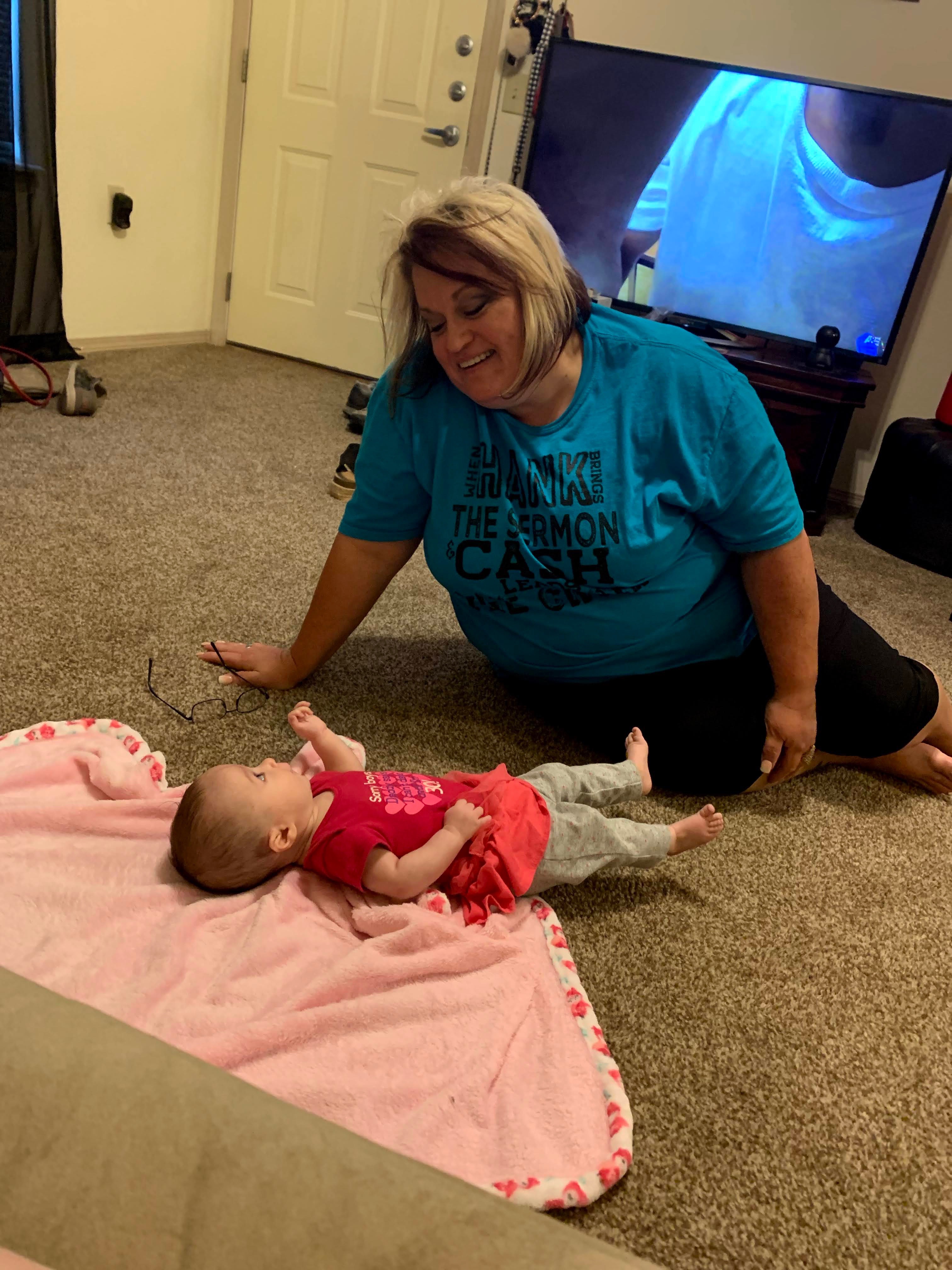 Playing with her great niece Grace. 
Such a heartwarming moment! 