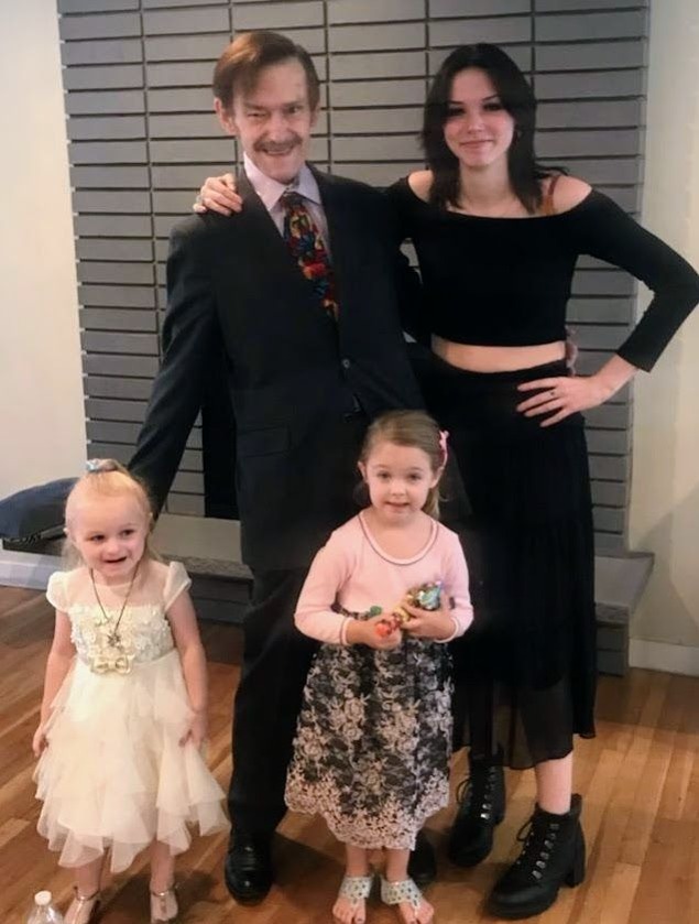 Bob and his three granddaughters: Charity, Lucy and Brie 2022