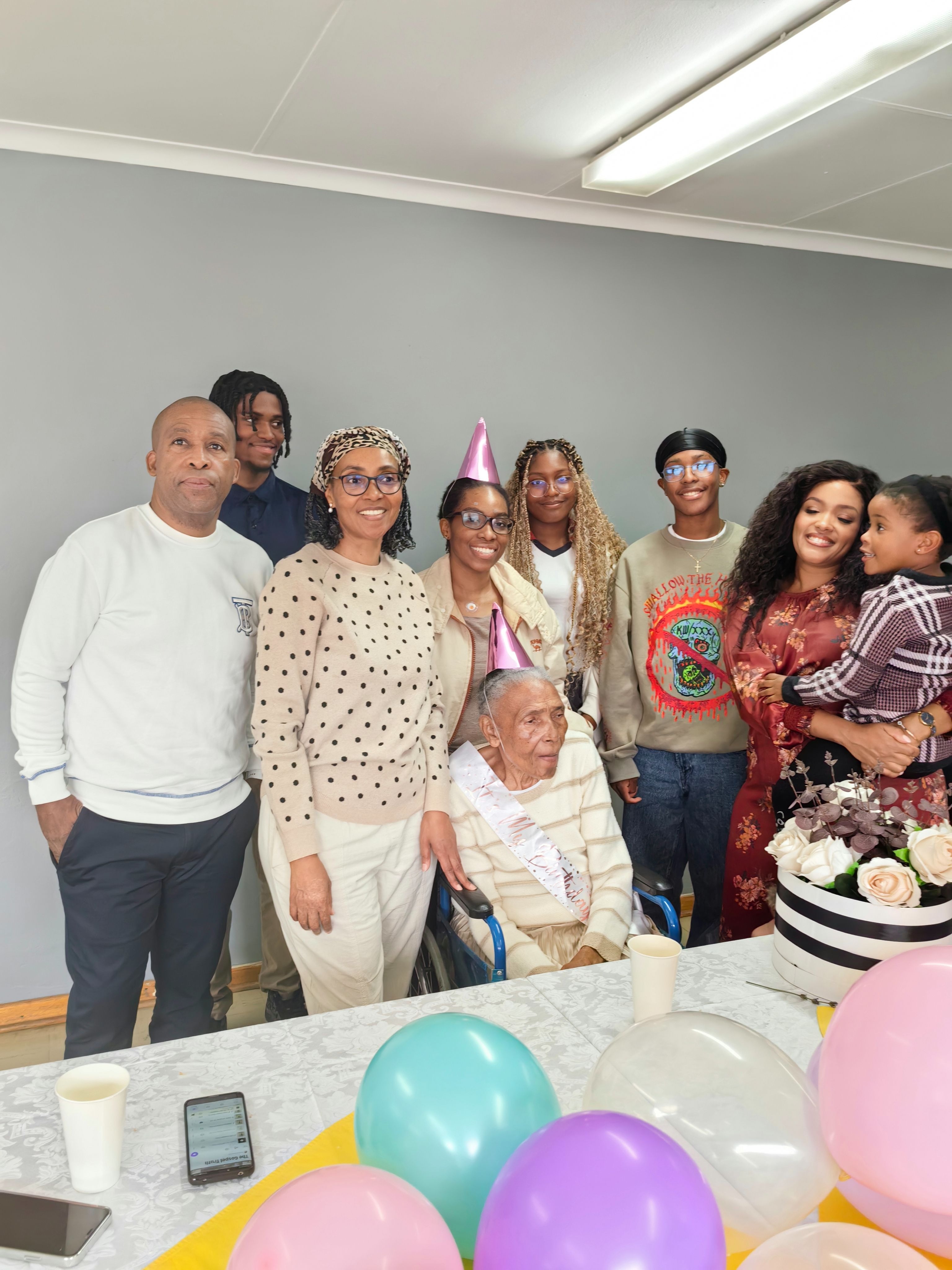 Gogo with her family at her 80th birthday at the Cosmos frail care home.