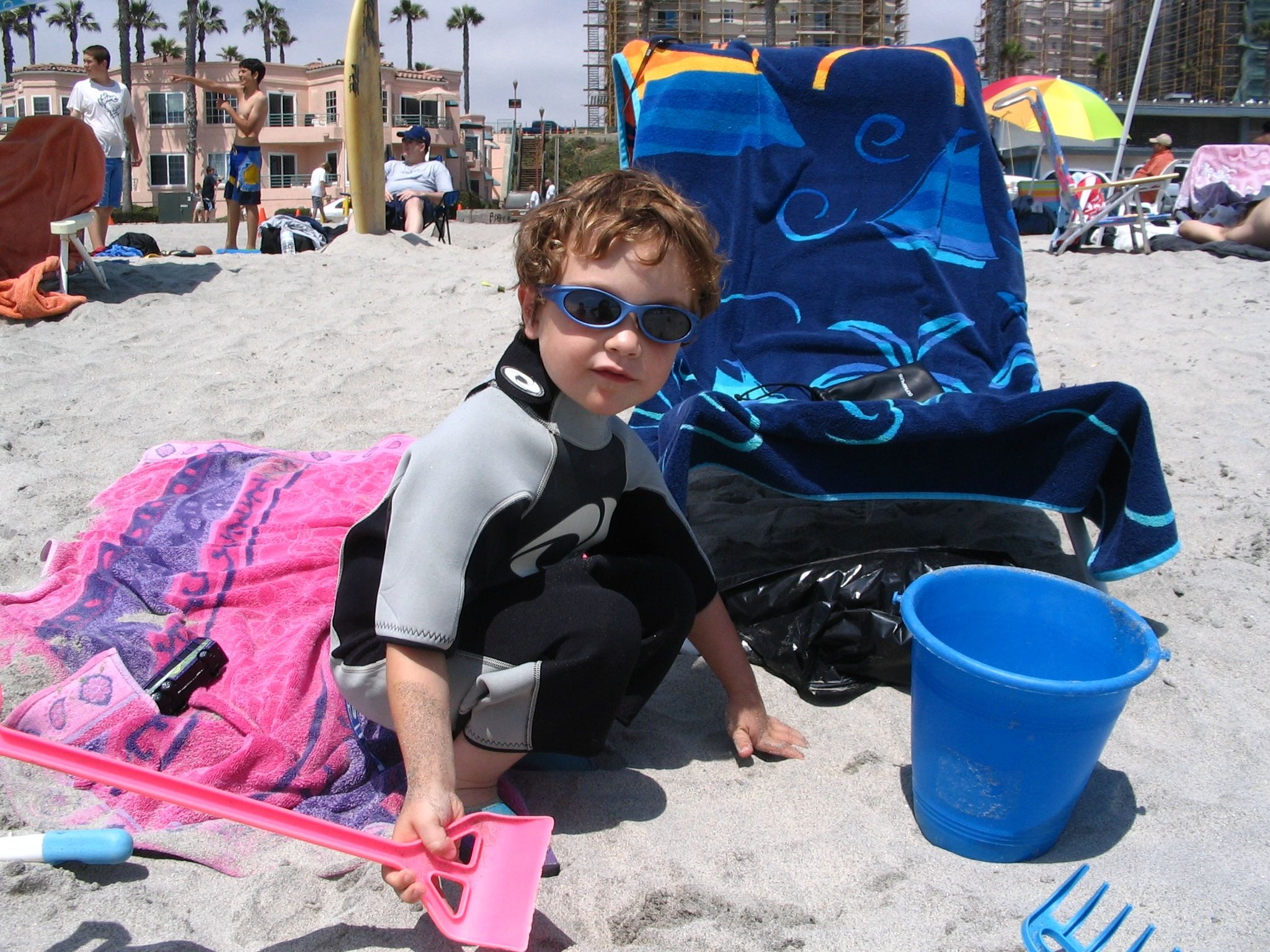 Again, Uncle Don isn't in this pic, but you can almost see him relaxing in his zero-gravity beach chair, with his can of Fresca, getting Hudson all duded out in the tiny wetsuit, and then bribing him to go in the water with the promise of gum! LOL!