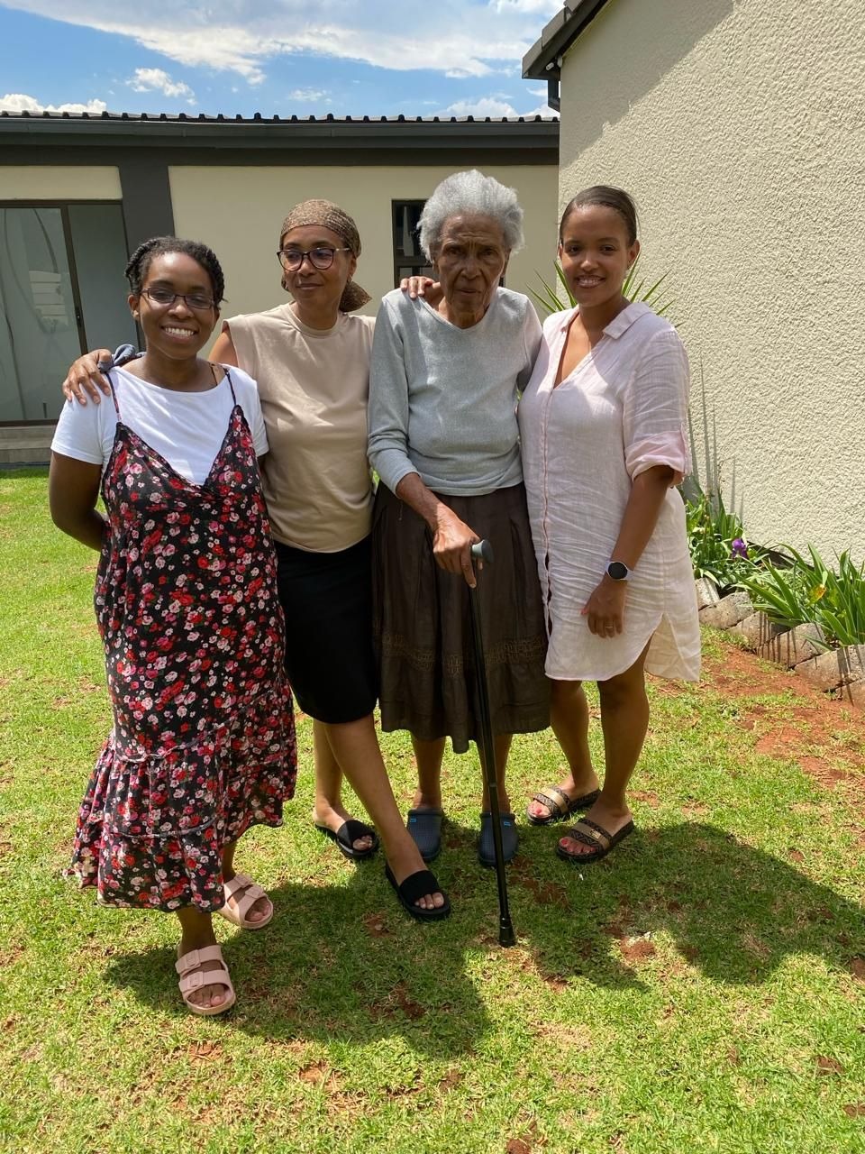 Gogo in 2023 with her daughter and granddaughters.