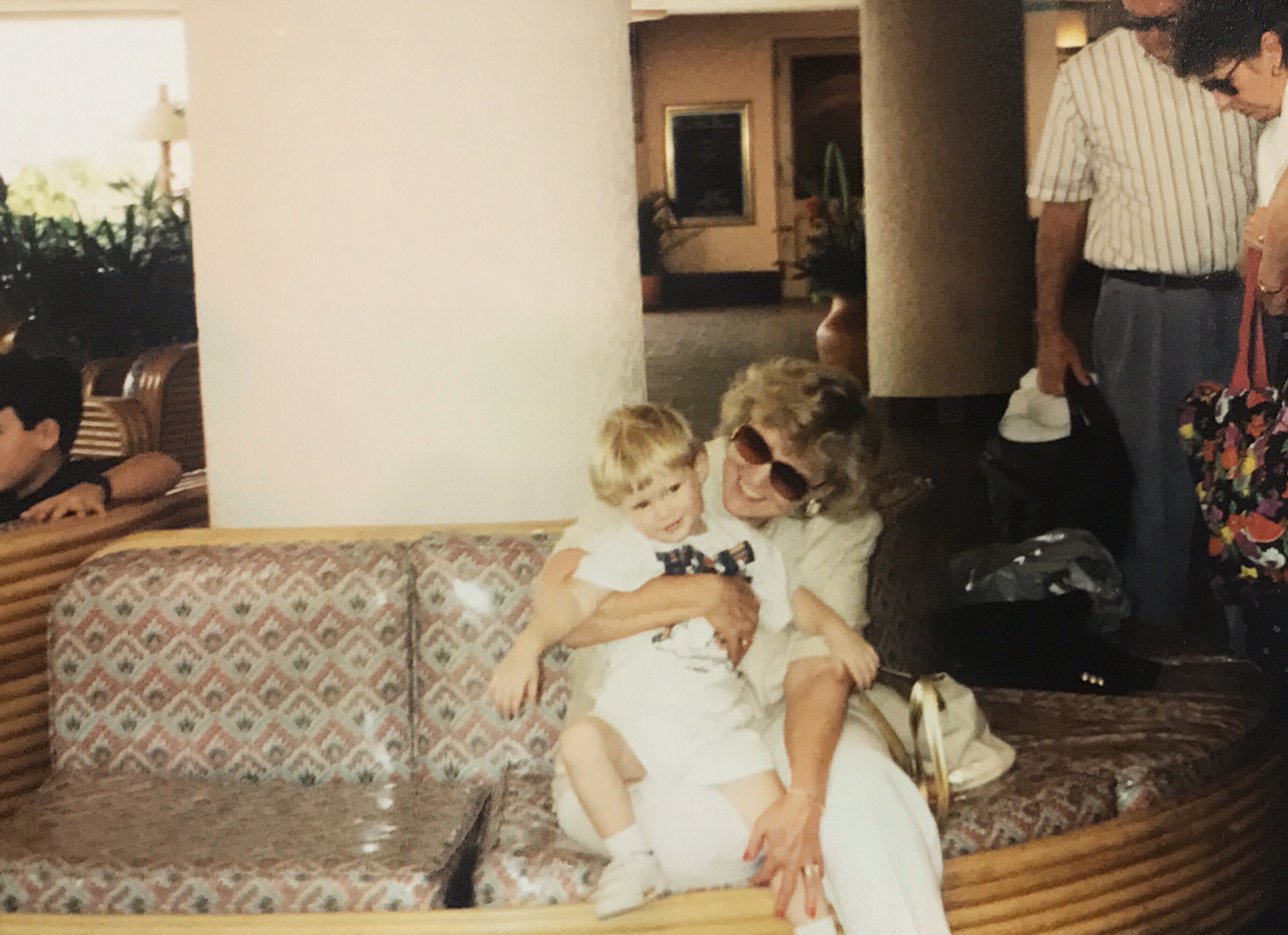 Granny didn’t just leave us with memories, she left us with a legacy. The kind of stories you tell over and over, because they’re too good not to share. She loved with everything she had, fiercely, protectively, and often with a side of sass.

Take, for example, the time I broke my arm in third grade. The doctor casually lifted it, then dropped it, asking, “Does that hurt?” Before I could answer, Granny, who was across the room, locked eyes on him like a heat-seeking missile. If looks could kill, that man would’ve needed a doctor himself. I may have been in pain, but I was more nervous for him.

Granny’s legacy is more than just stories, though. Sometimes when I’m absentmindedly kicking my foot or drumming my fingers on the steering wheel, I think, “Well, there she is again.” She’s woven into our habits, our humor, our stubborn streaks, and yes, our beauty routines. Because if she taught us anything, it’s that you never leave the house without your hair done. Ever. Not to mention that a napkin or paper towel hates to see me coming. 

But above all, Granny taught us about love. The kind that’s brave, empathetic, dignified, and resilient. The kind that lifts people up, defends what matters, and never lets you leave hungry. 

Thank you, Granny. For your fierce love, your sharp wit, your steady presence, and for the countless ways you shaped who we are. We miss you dearly, but your mark on our hearts is permanent. 