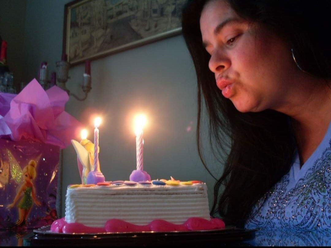 I love this photo of her blowing out her birthday candles. She loved celebrating her birthday. She would start talking about it a month early and we always made it a very special day for her.